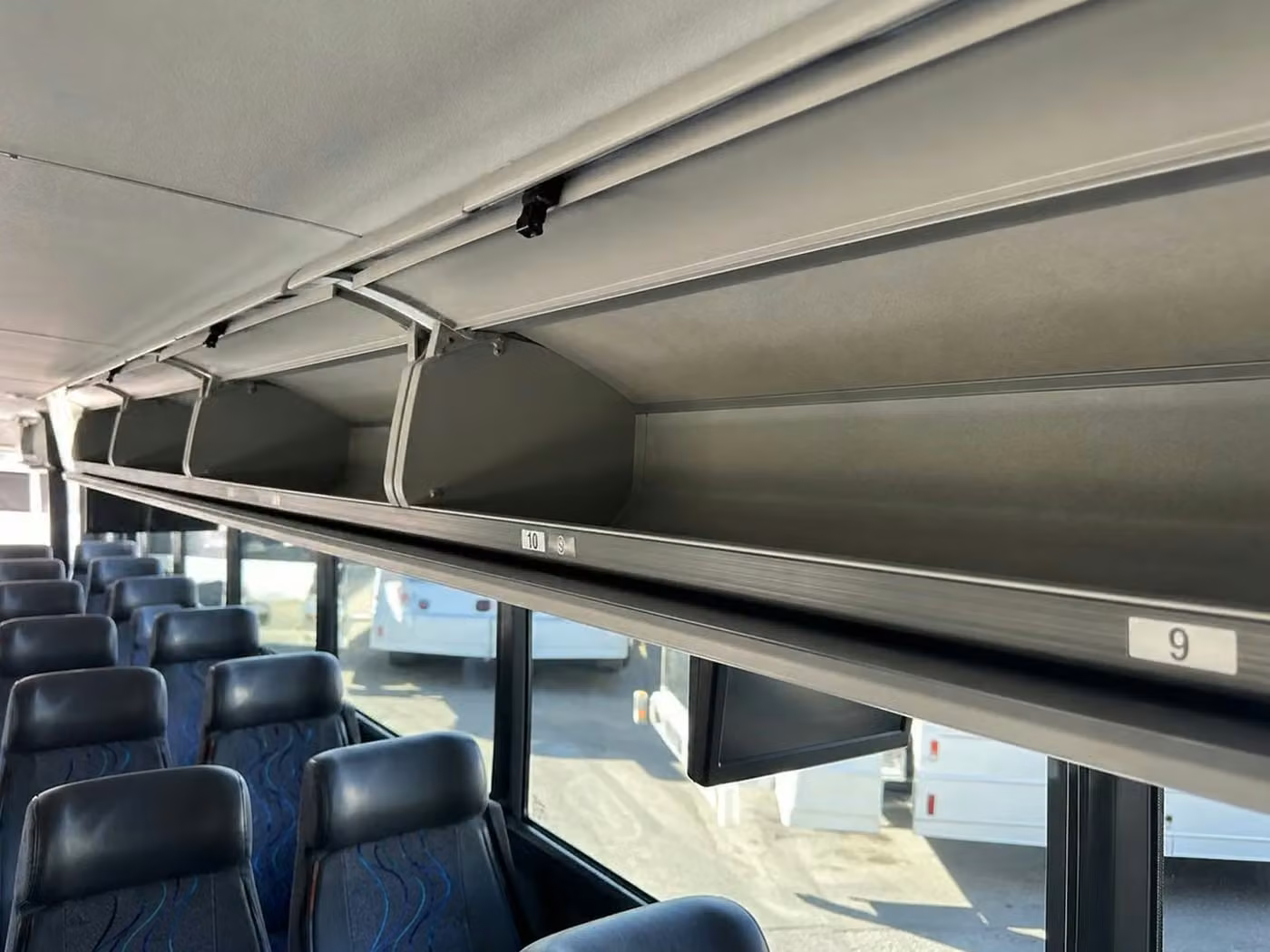 estero 18 passenger minibus overhead storage