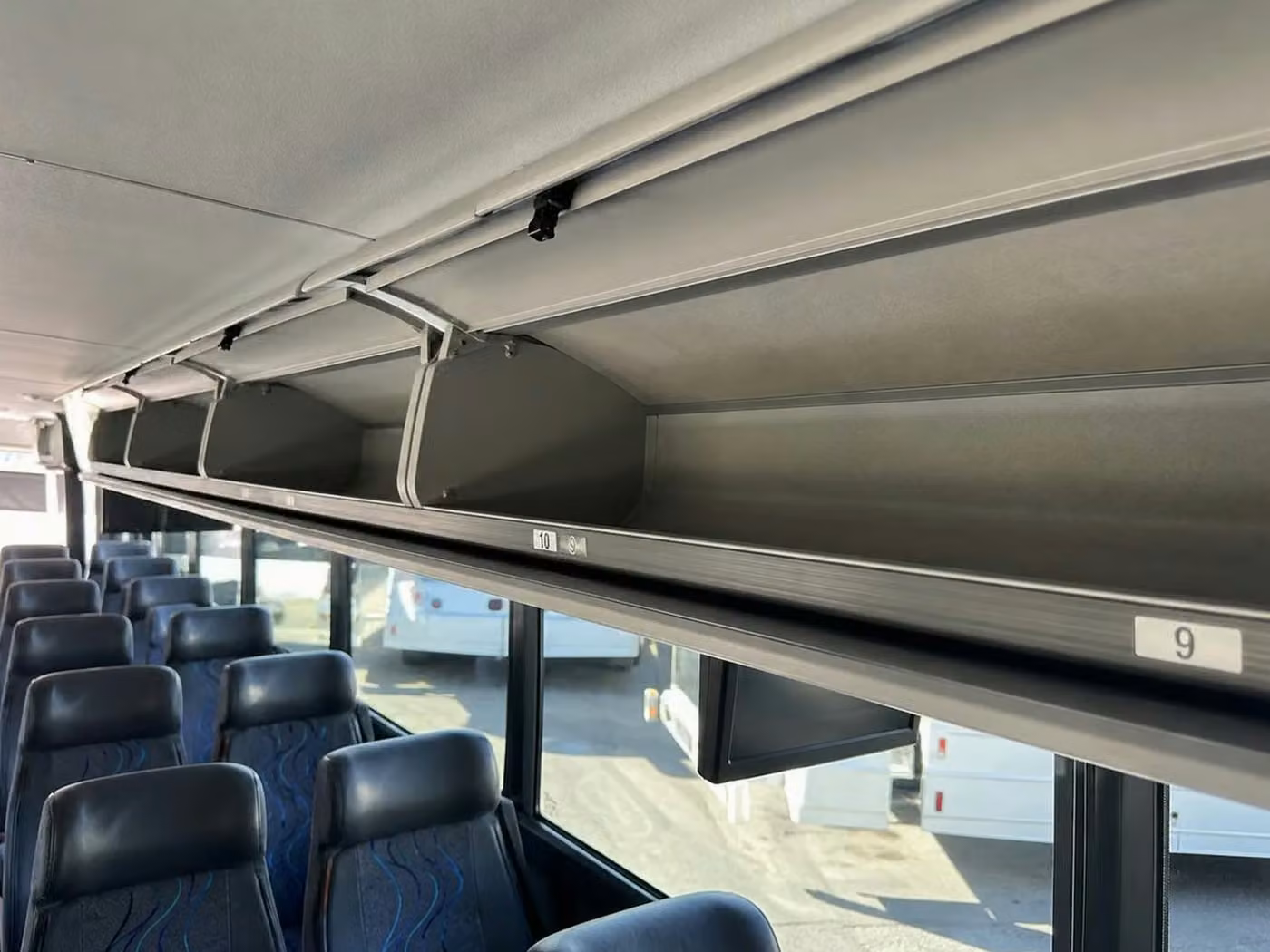 estero 28 passenger minibus overhead storage