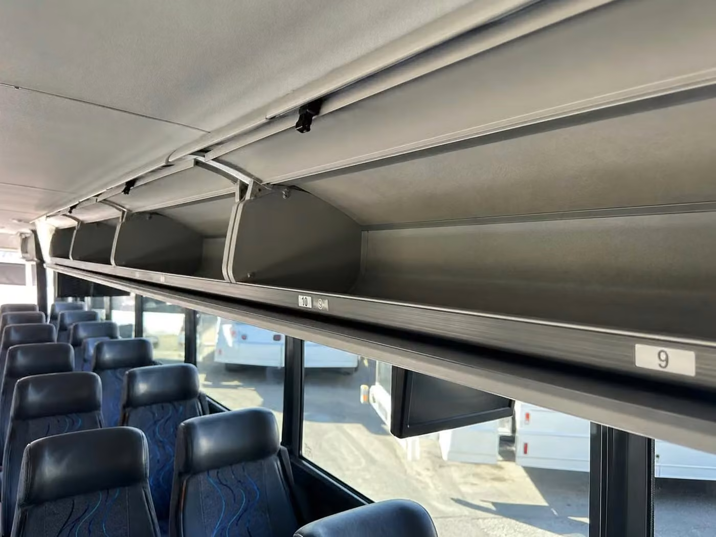 estero 35 passenger minibus overhead storage