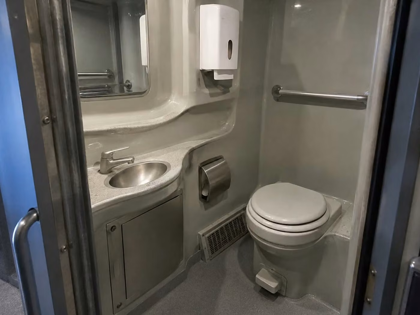 estero charter bus onboard restroom